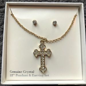 Cross necklace with matching earrings.